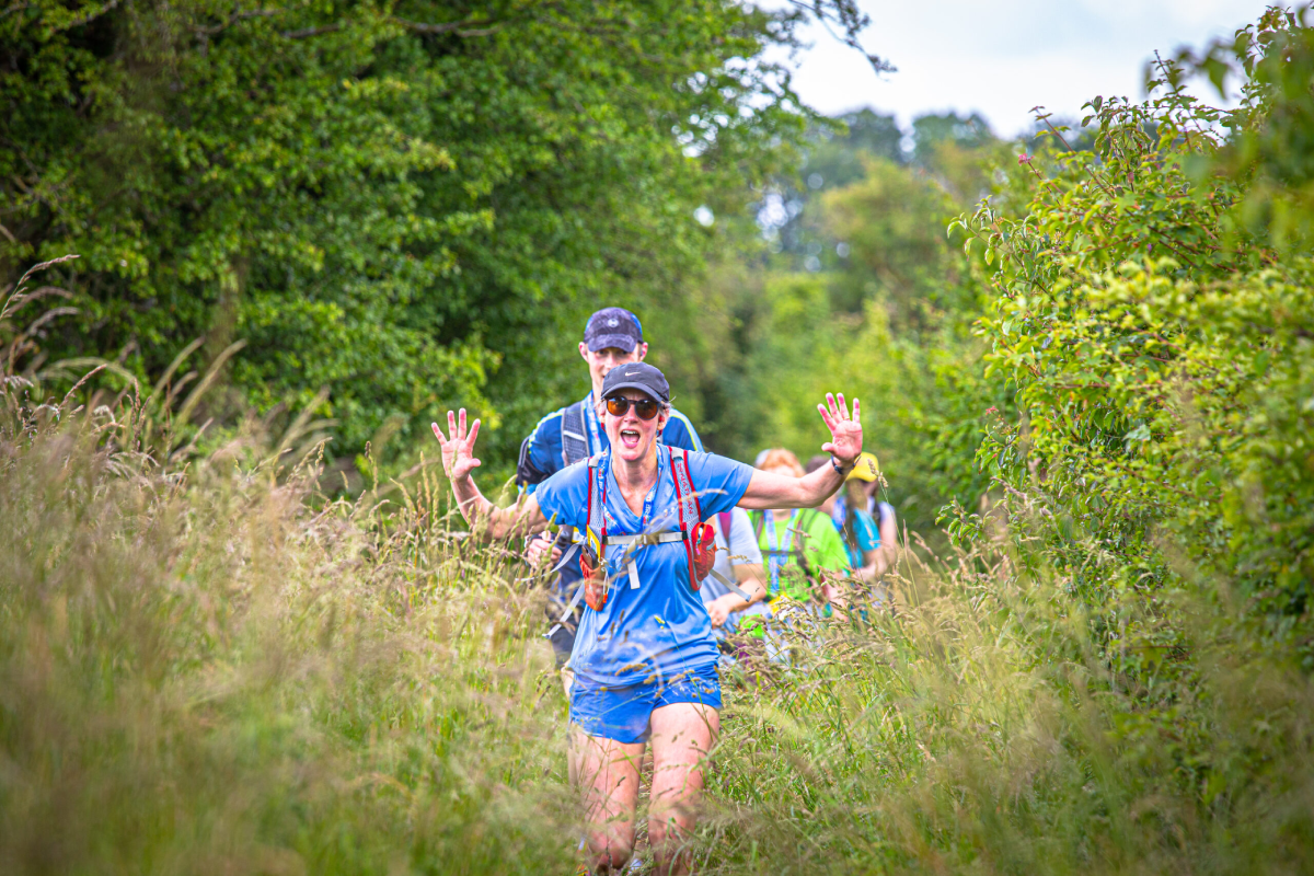 North Downs 50 Ultra Challenge Participant Waving Scaled