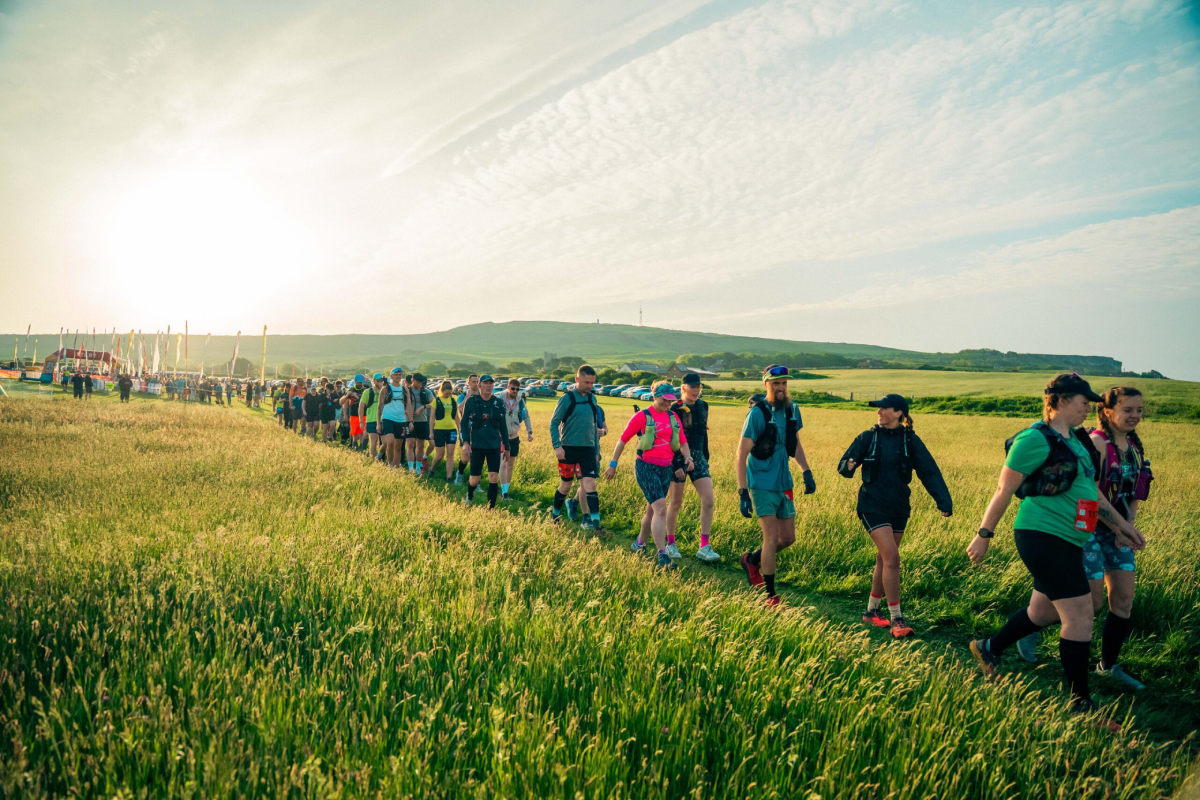 Isle Of Wight Ultra Challenge Particpants Walking Through Countryside Scaled