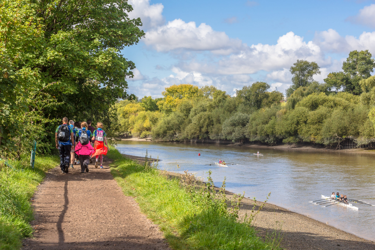 Thames Path Ultra Challenge Participants Walking Alongside The River Scaled